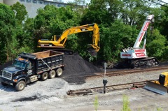 Truck after truck is filled with coal